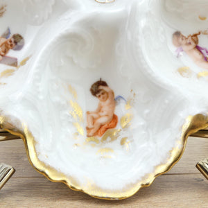 Assiette à huîtres Limoges 19e siècle avec Anges et Chérubins décor en dorures N1