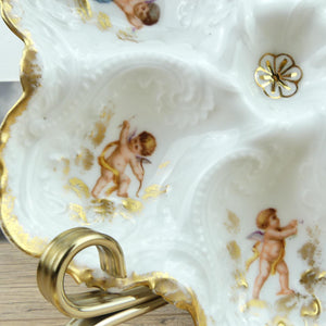 Assiette à huîtres Limoges 19e siècle avec Anges et Chérubins décor en dorures N2