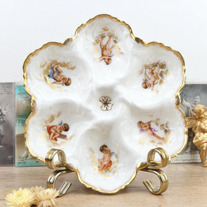 Assiette à huîtres Limoges 19e siècle avec Anges et Chérubins décor en dorures N4